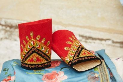 Pair of embroidered felt clothing sleeves...