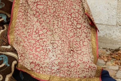 Tablecloth, lace lined in red silk, with...