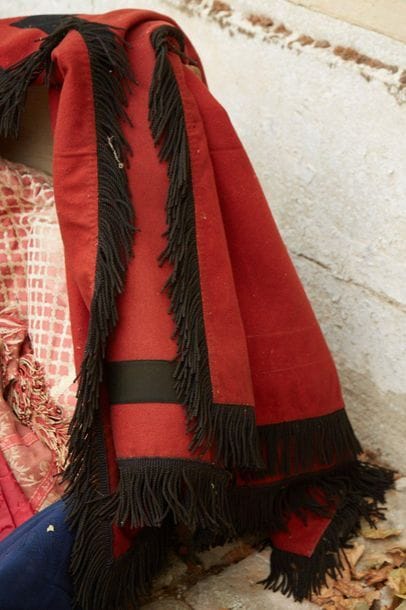 Orange tablecloth, braided with textiles...
