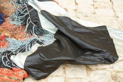 Black and blue silk satin hanging with large...