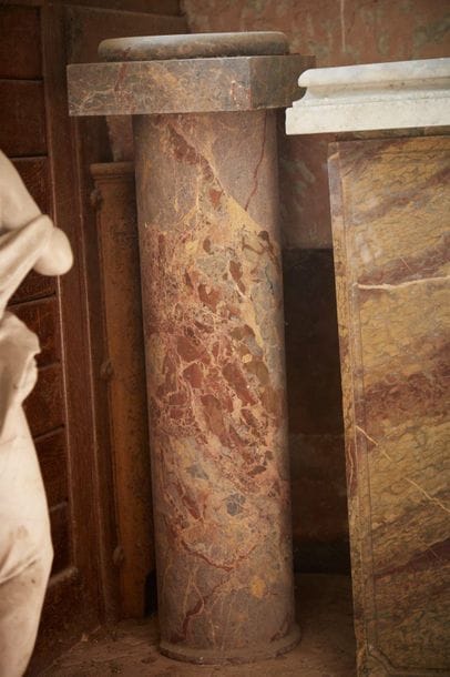 Grey and red marble column and its base.

Height:...