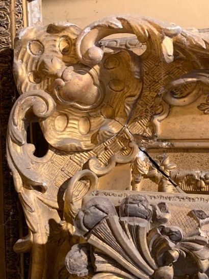 Three wooden and gilded stucco frames, two...
