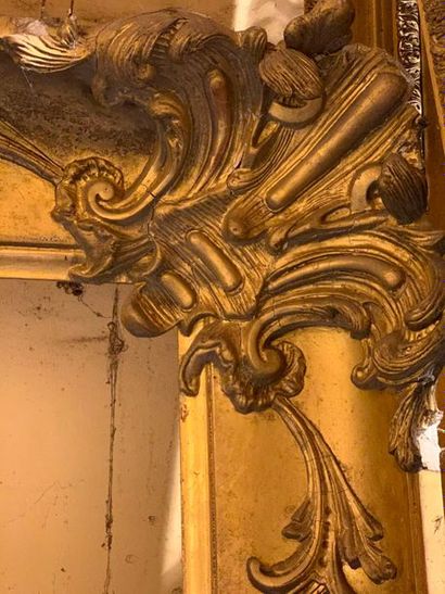 Three wooden and gilded stucco frames, two...