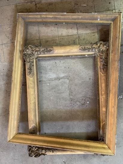 Two gilded stucco and wood frames, one decorated...