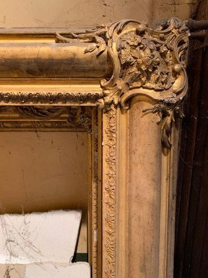 Wooden frame and gilded stucco with spandrels...