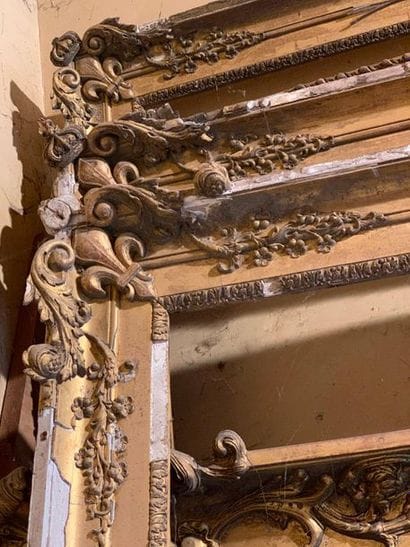 Two very large frames with fleur-de-lys spandrels...
