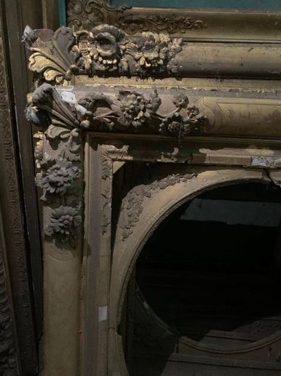 Two Louis XIV-style wooden and gilded stucco...