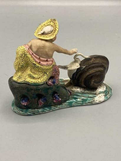 Statuette en céramique polychrome représentant...