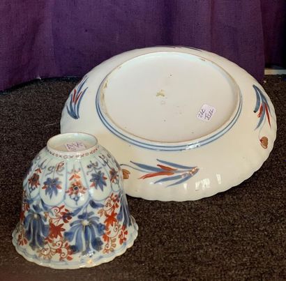 Tasse et sa sous tasse en porcelaine de Chine...