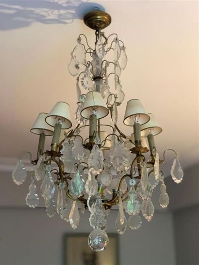 Lustre en bronze à huit bras de lumière et...