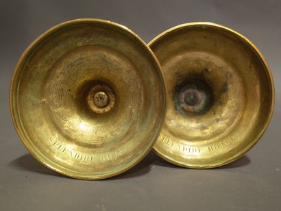 Two bronze torches in the Louis XVI style,...