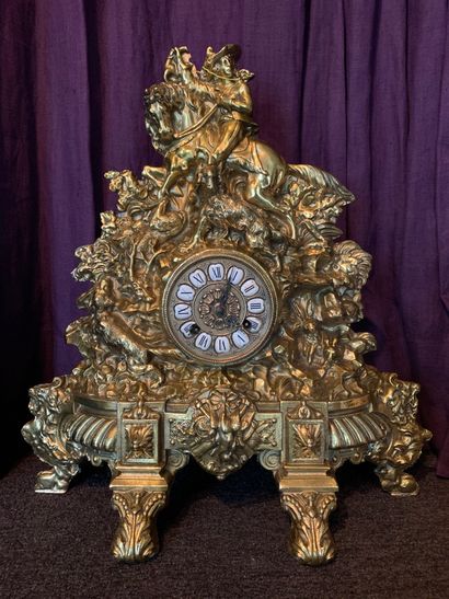 Gilded bronze clock with relief decoration...