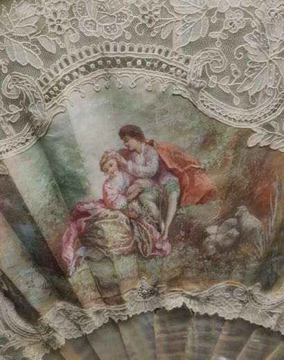 Mother-of-pearl and lace fan decorated with...