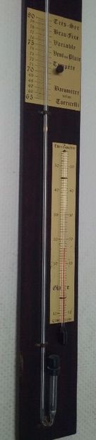 A mercury and alcohol barometer/thermometer.

Height:...