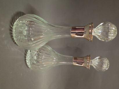Pair of blown glass decanters, metal frame.

(A...