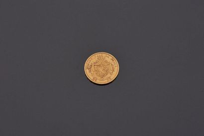 Une pièce or 20 francs or belge 1877 Léopold...