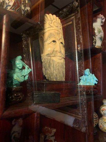 Two statuettes in blue stone

twentieth century...