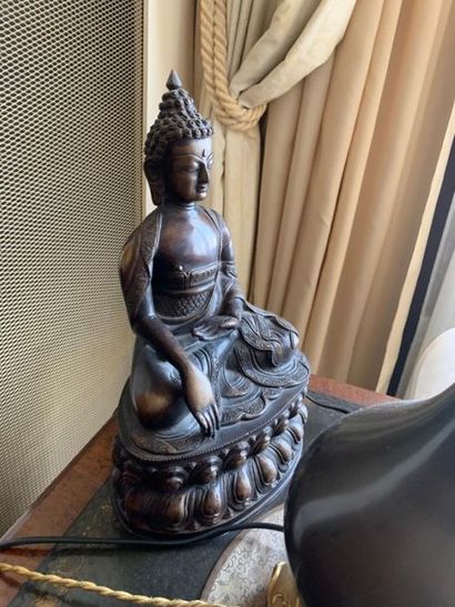 Bronze statuette representing Buddha with...