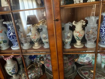 About twenty small vases in various opal...