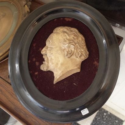 Three coloured plaster profiles of Napoleon...