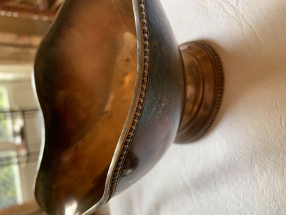Lot en métal argenté comprenant une saucière...