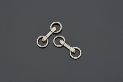 Paire de boutons de manchettes en argent...