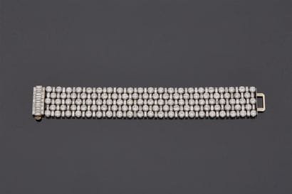 Bracelet en or gris 18 k (750 millièmes)...