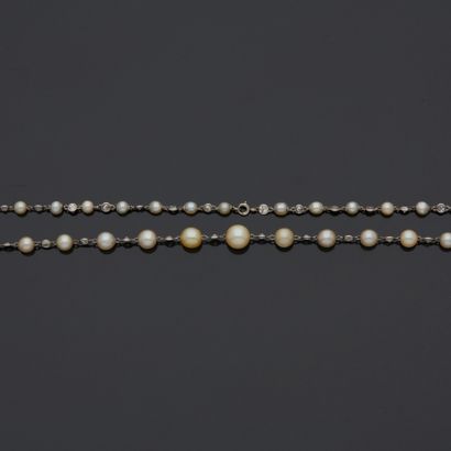 
Long collier en or gris 18 k (750 millièmes)...