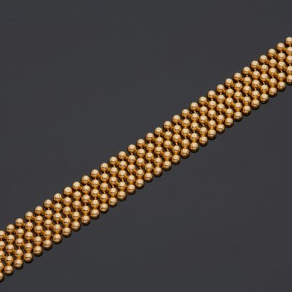 Bracelet souple en or jaune 18 k (750 millièmes)...