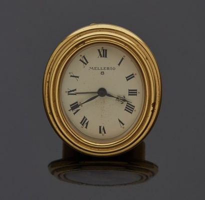 Pendulette de voyage MELLERIO en bronze doré...