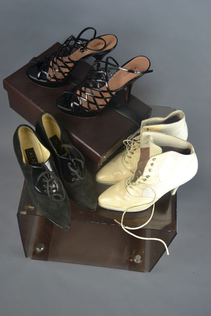 *ALAIA

-Black patent leather sandals with...