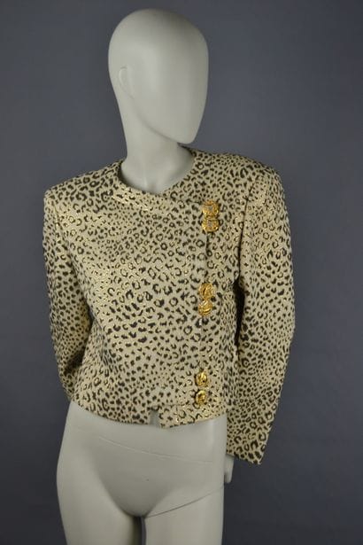 *VALENTINO

Veste croisée courte en lurex...