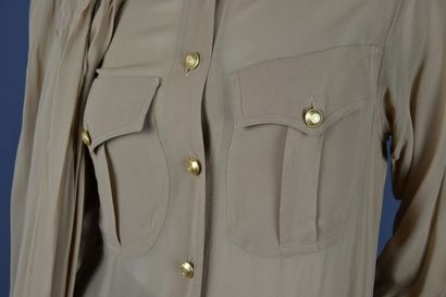 Alberta FERRETTI

Chemise et étole frangée...