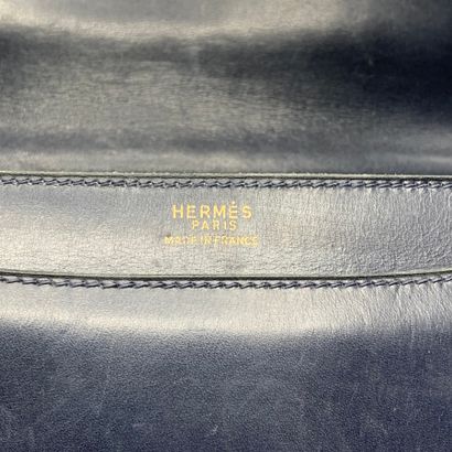 
HERMES Paris

Sac en box bleu marine, fermoir...