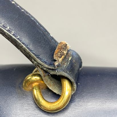 
HERMES Paris

Sac en box bleu marine, fermoir...