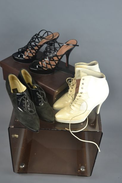 *ALAIA

-Black patent leather sandals with...