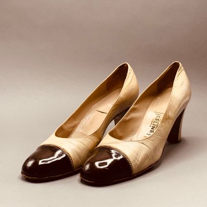 
CELINE Paris

Beige leather pumps with brown...