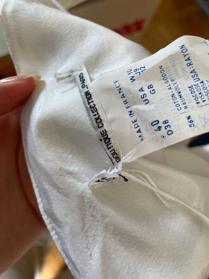 Lot of clothes including :

GIVENCHY

- White...