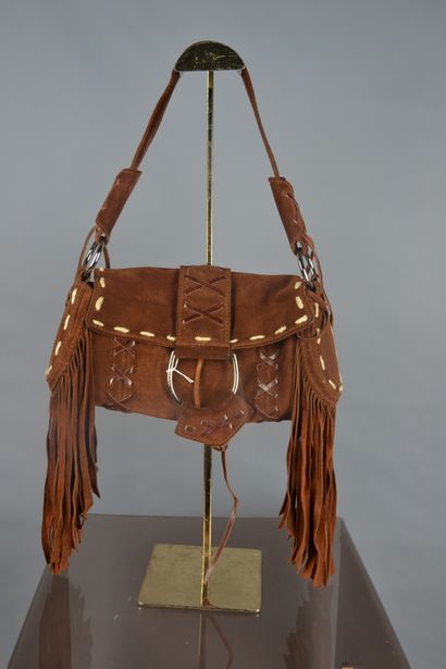 *DOLCE & GABANNA

Sac baguette en daim marron...