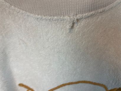 HERMES 

Lot de deux joggings : 

- Ensemble...