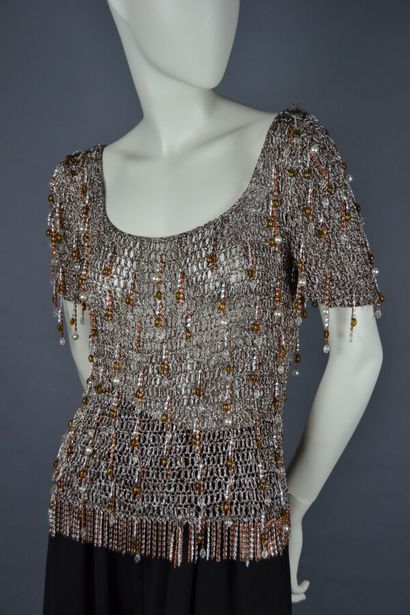 Loris AZZARO

Top en mailles de lurex bronze...