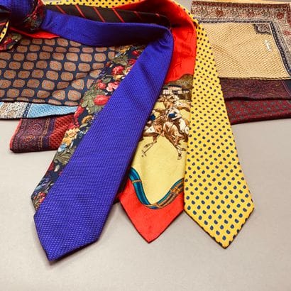Lot of clutches and ties including : 

CHRISTIAN...