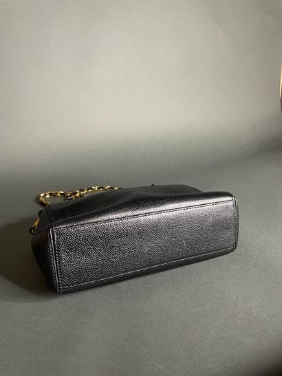 
CHANEL

Black calfskin bag, front embroidered...