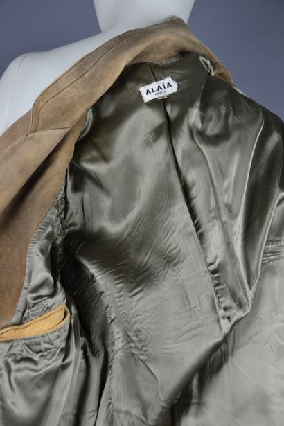 ALAIA Paris

Light brown long jacket with...