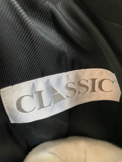 Lot of clothes including :

René WELLS

-...