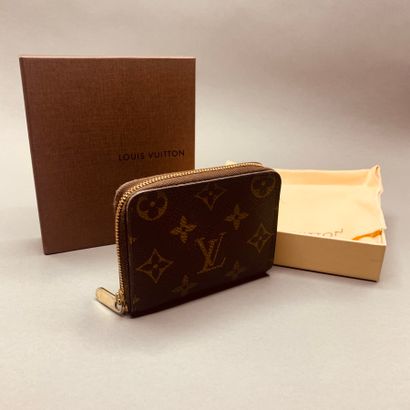 Louis VUITTON Paris

Monogram leather wallet,...