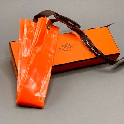 HERMES Paris

Rain hood in transparent orange...