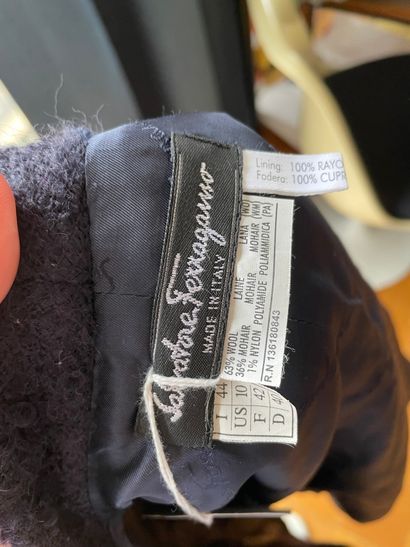 Lot of clothes including :

Salvatore FERRAGAMO

-...
