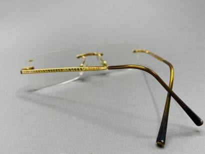Lot of glasses including : 

PRADA. Eyeglasses,...