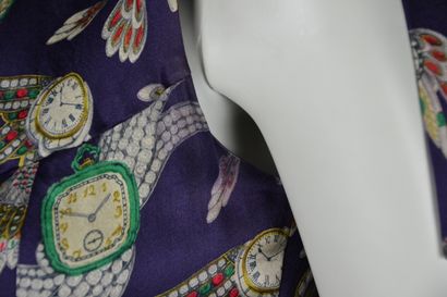 CHANEL

Blouse sans manche en soie à motifs...